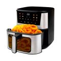 TESLA AirCook Q60 XXL Pro Fritteuse mit offener Schublade, voll mit knusprigen Pommes Frites und Zwiebelringen, bereit zum Servieren.