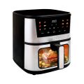 TESLA AirCook Q60 XXL Pro Fritteuse beim Garen von saftigem Fleisch mit Gemüse, mit sichtbarer Backfunktion durch ein durchsichtiges Fenster.
